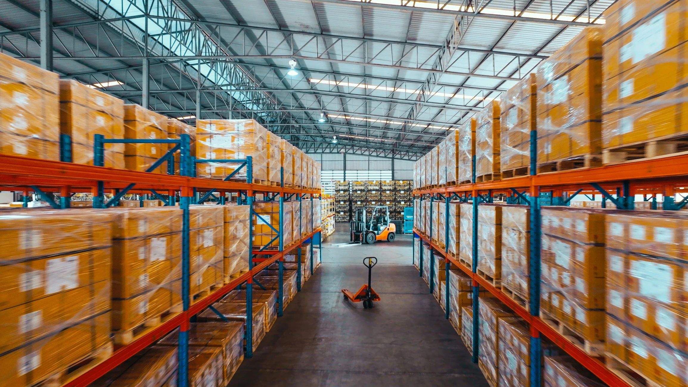 Packages stored on warehouse shelves